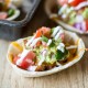 Get all of that layered bean dip flavor with much less work in these two-bite snacks. Like miniature bean burritos, these bean dip bites are topped with melty cheese, seasoned guacamole, fresh pico de gallo, and tangy sour cream. Finger food never tasted so good! These quick and easy Loaded Bean Dip Bites are the perfect snack for after school or while watching the big game.