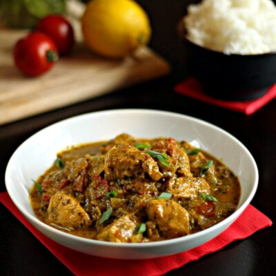 Indian Cilantro Chicken garnished with cilantro in a bowl.