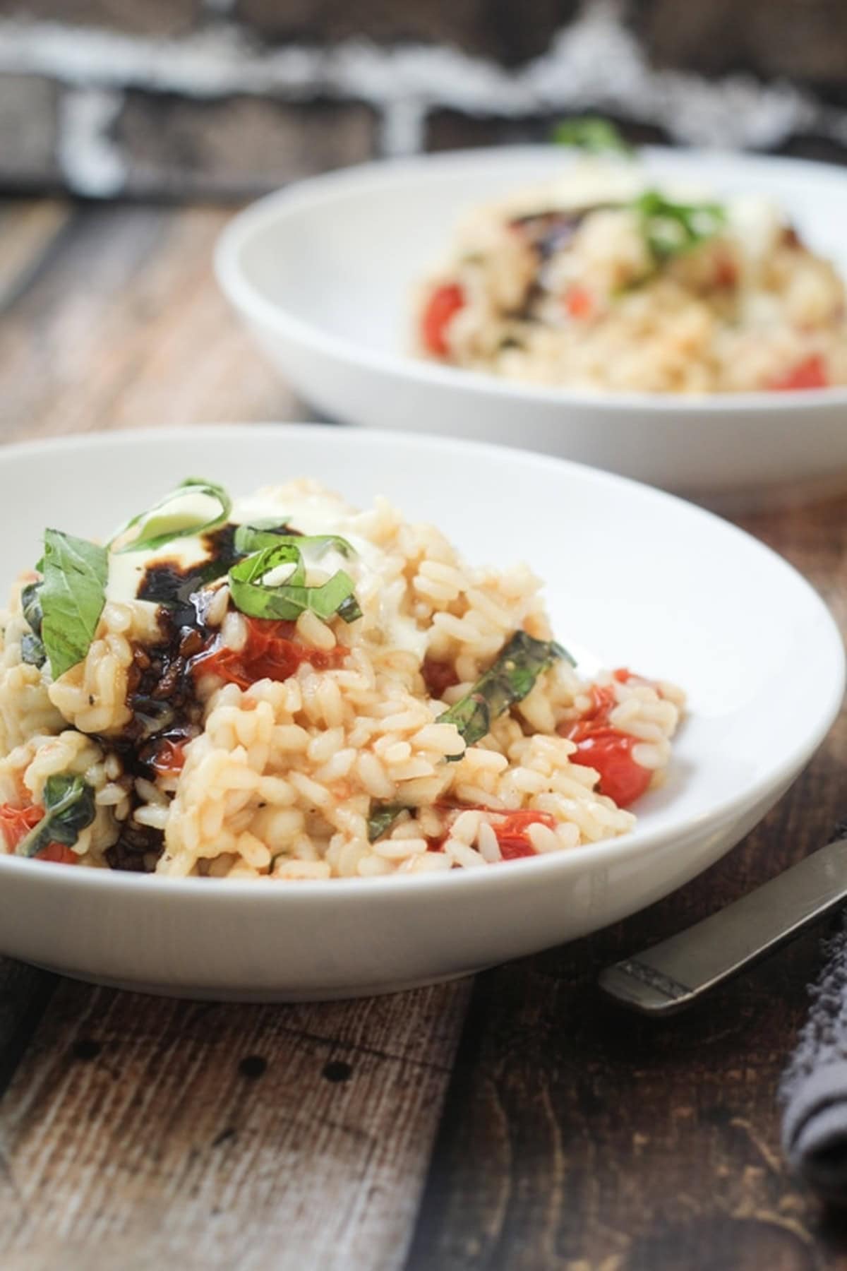 Two servings of tomato basil risotto with mascarpone.