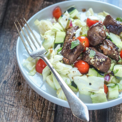 Vietnamese steak salad served in a bowl.