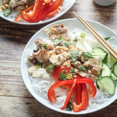 Vietnamese Vermicelli Noodle Bowl on a plate with chopsticks.