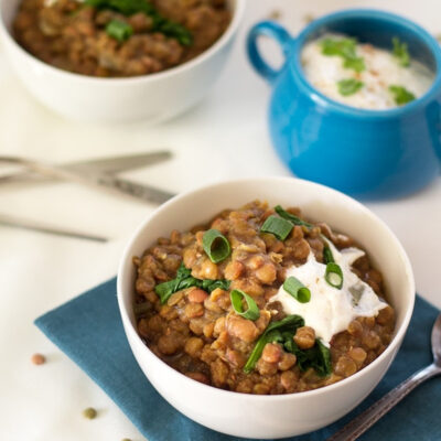 A bowl with Indian Lentil Soup Slow Cooker.