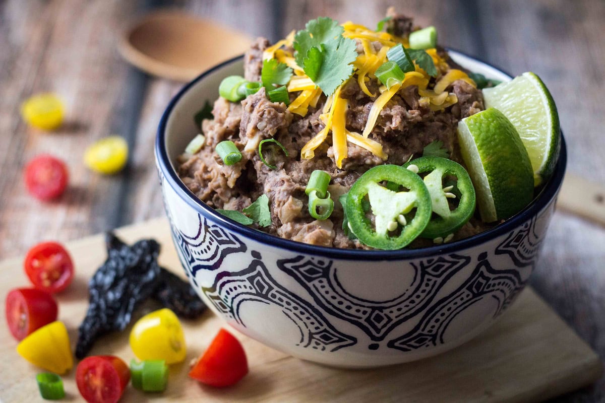 Vegetarian refried beans served in a bowl.