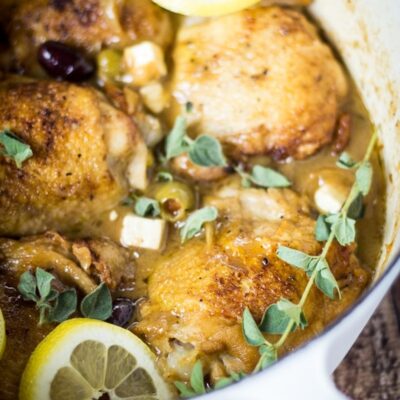 Greek Braised Chicken Thighs on a serving dish.