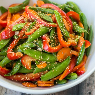 Asian Snap Pea Salad served in a bowl.