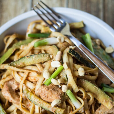 A bowl with spicy peanut noodles.