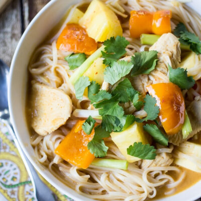 Bowl of Thai Pineapple Curry served with rice.