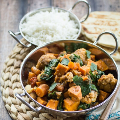 A pot of Sweet Potato and a pot of rice on a table.