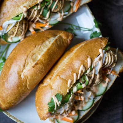 Vegan Bahn Mi meatballs sandwich on a plate.