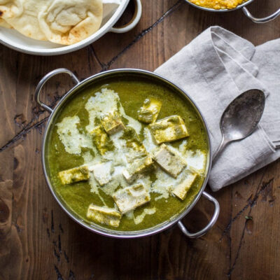 Vegan Palak Paneer served in a bowl.