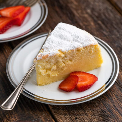A plate with a slice of fluffy Japanese cheesecake.