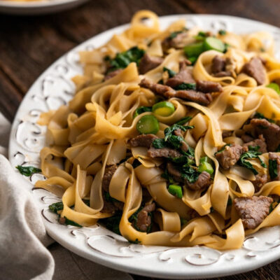 A white plate with Beef pad see ew.