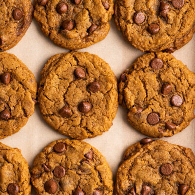 These Vegan Pumpkin Chocolate Chip Cookies are oooey, gooey, and full of Pumpkin flavor. They are the perfect Fall dessert that takes only 30 minutes to make!