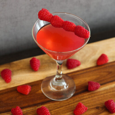 Treat yourself to this vibrant Raspberry Martini. A sweet and colorful cocktail for any time of the year!