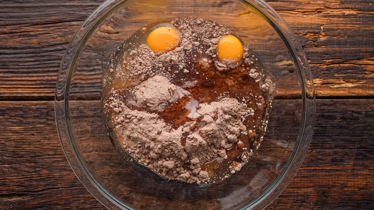 Ingredients for sheet cake cookies in a glass bowl.