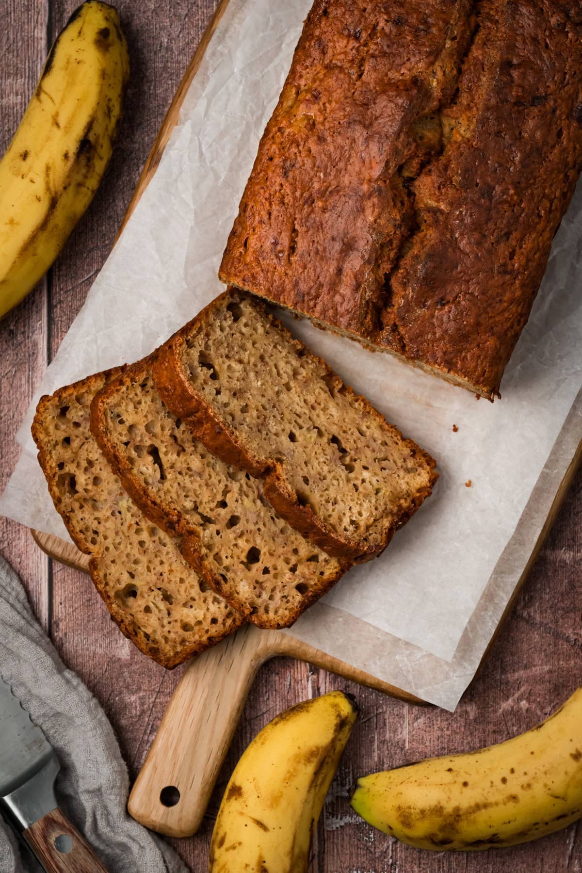 4 Ingredient banana bread on a cutting board.