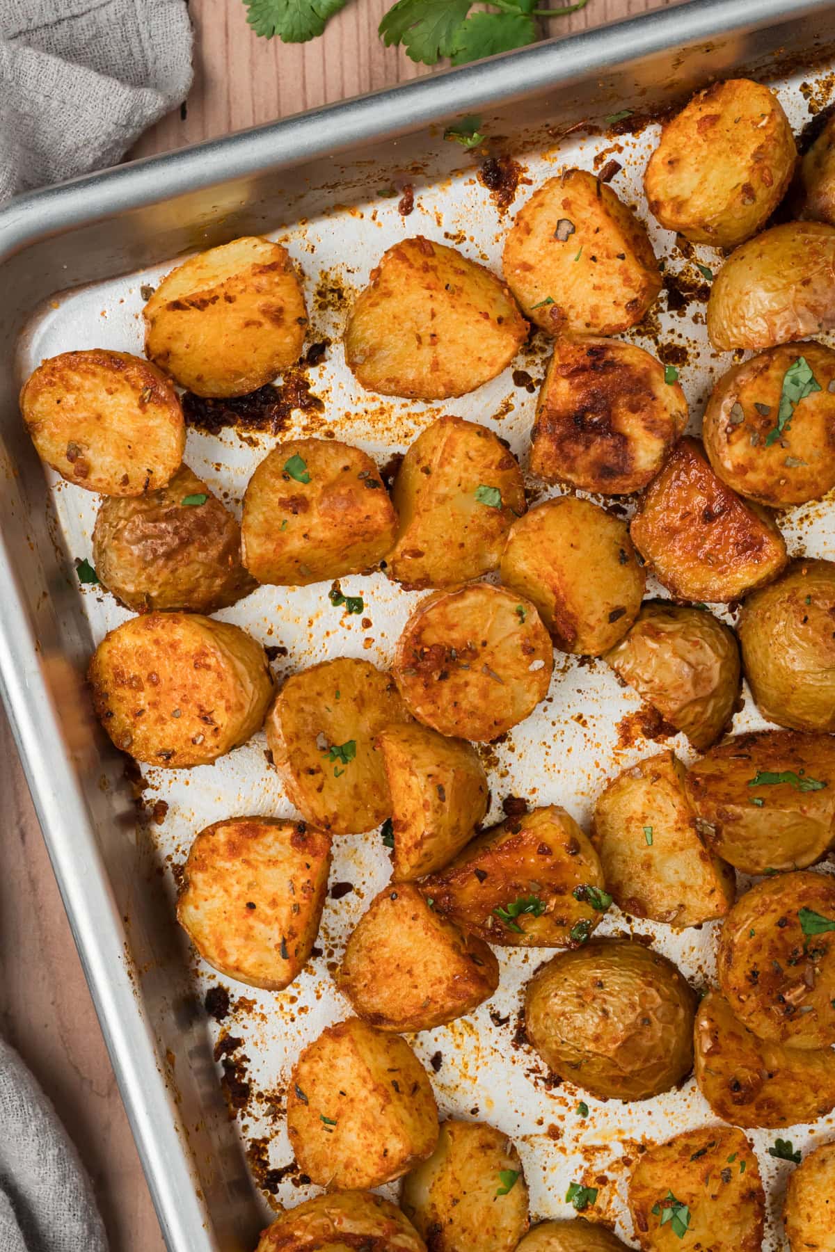 Mexican potatoes on a baking sheet.