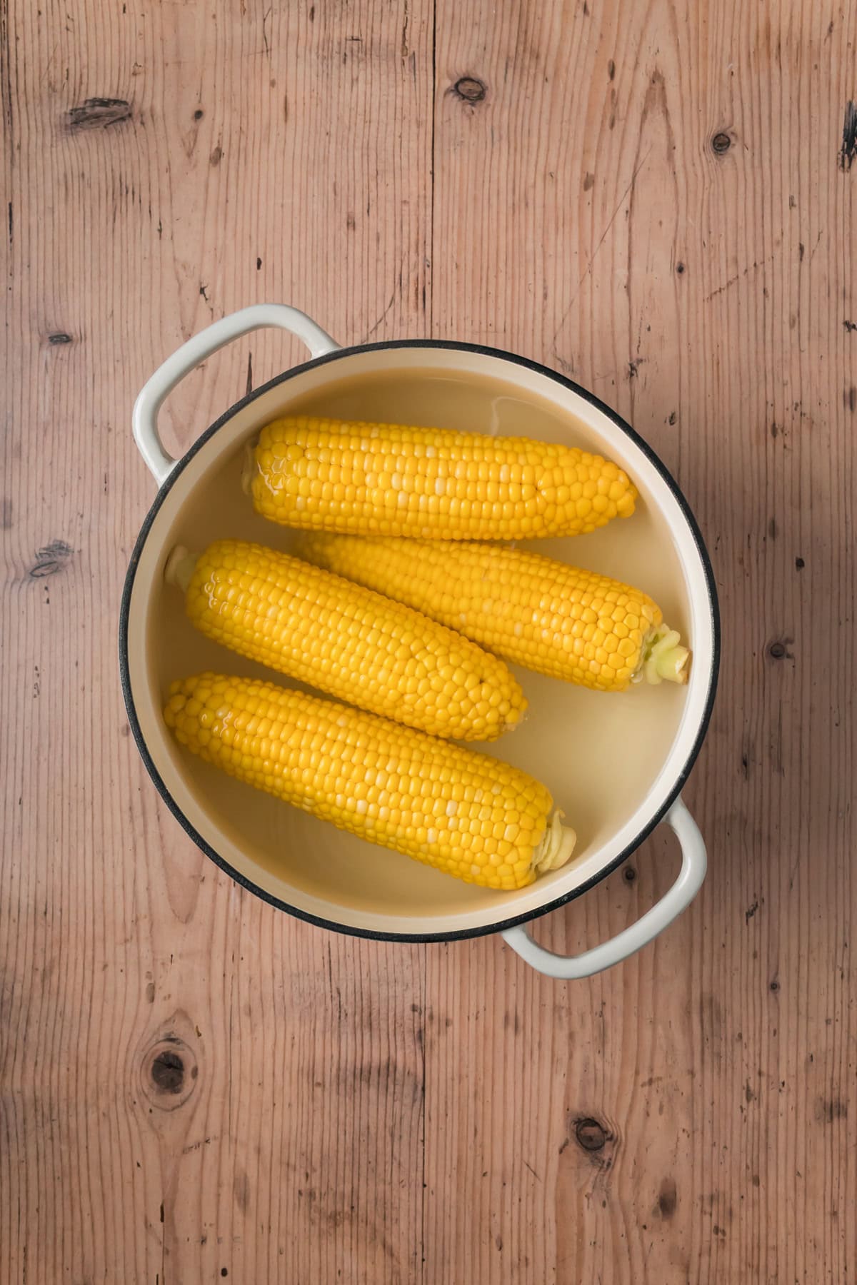 Corn in a pot of water.