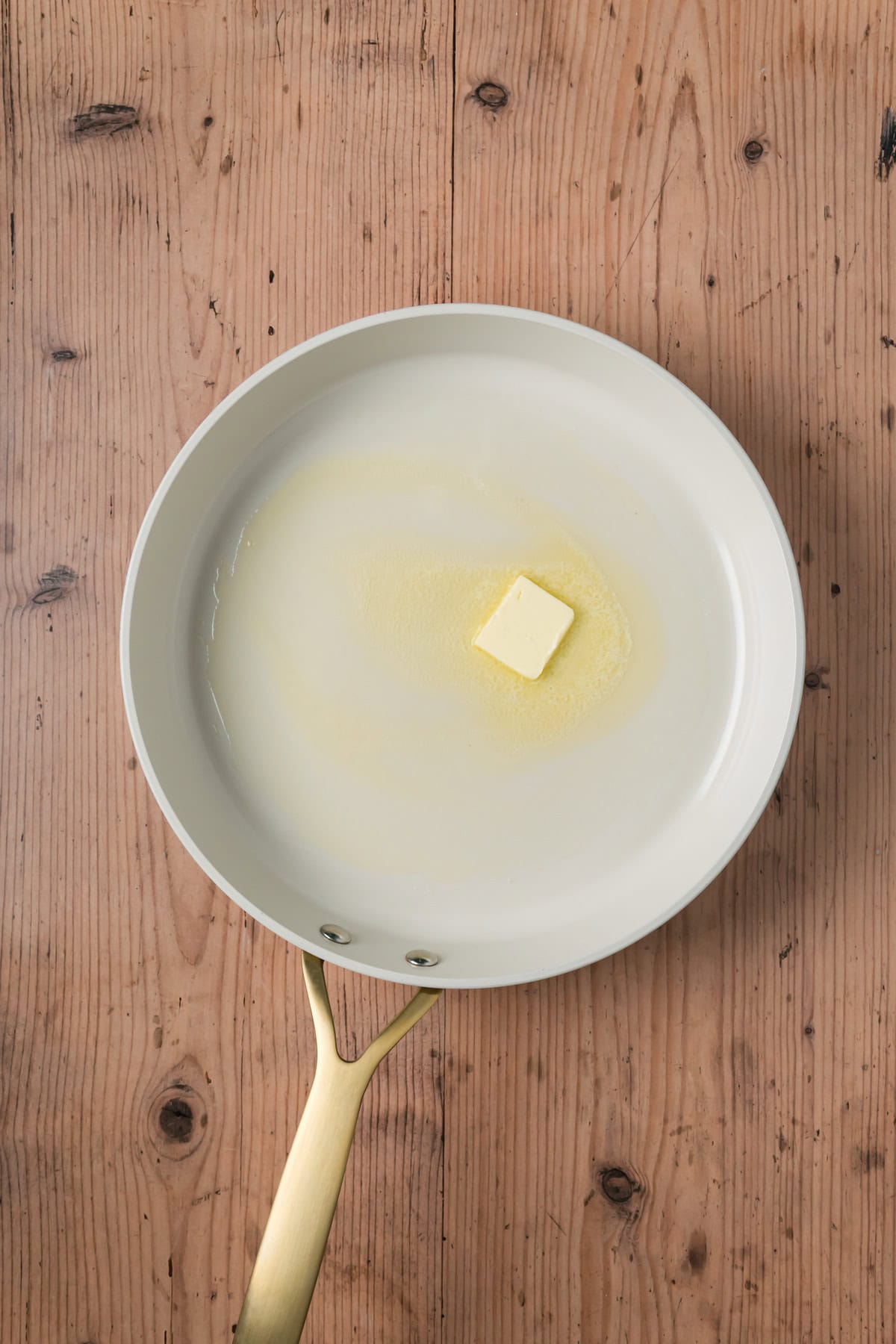 Butter in a pan.