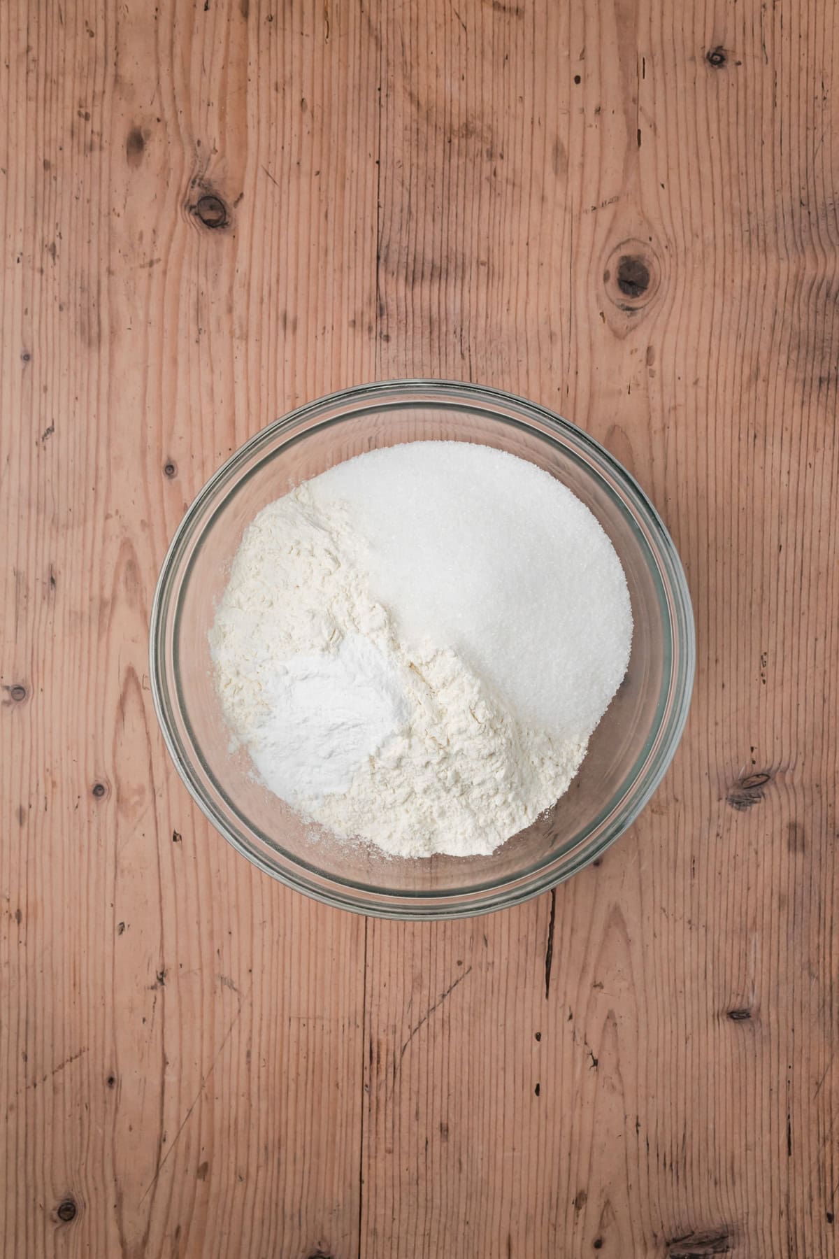 Dry ingredients in a glass bowl.