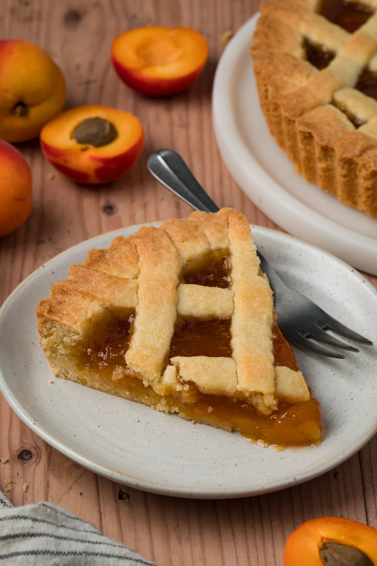 A slice of crostata on a plate.