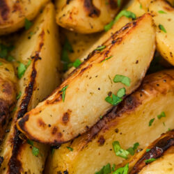 These Greek Lemon Potatoes are tender and golden with bright citrus flavor, savory herbs, and irresistibly crisp edges that everyone will love.