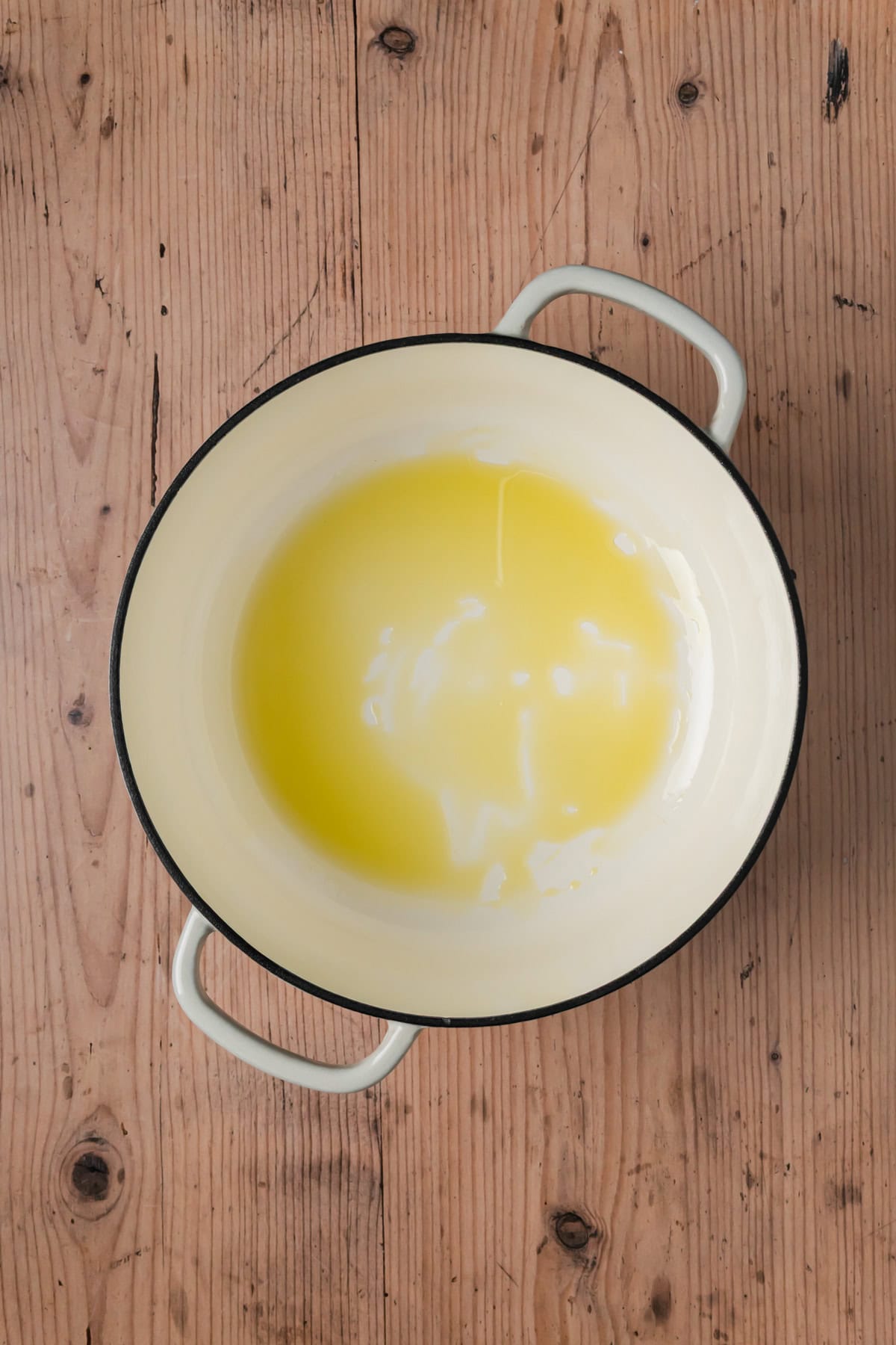 Olive oil in a Dutch oven.