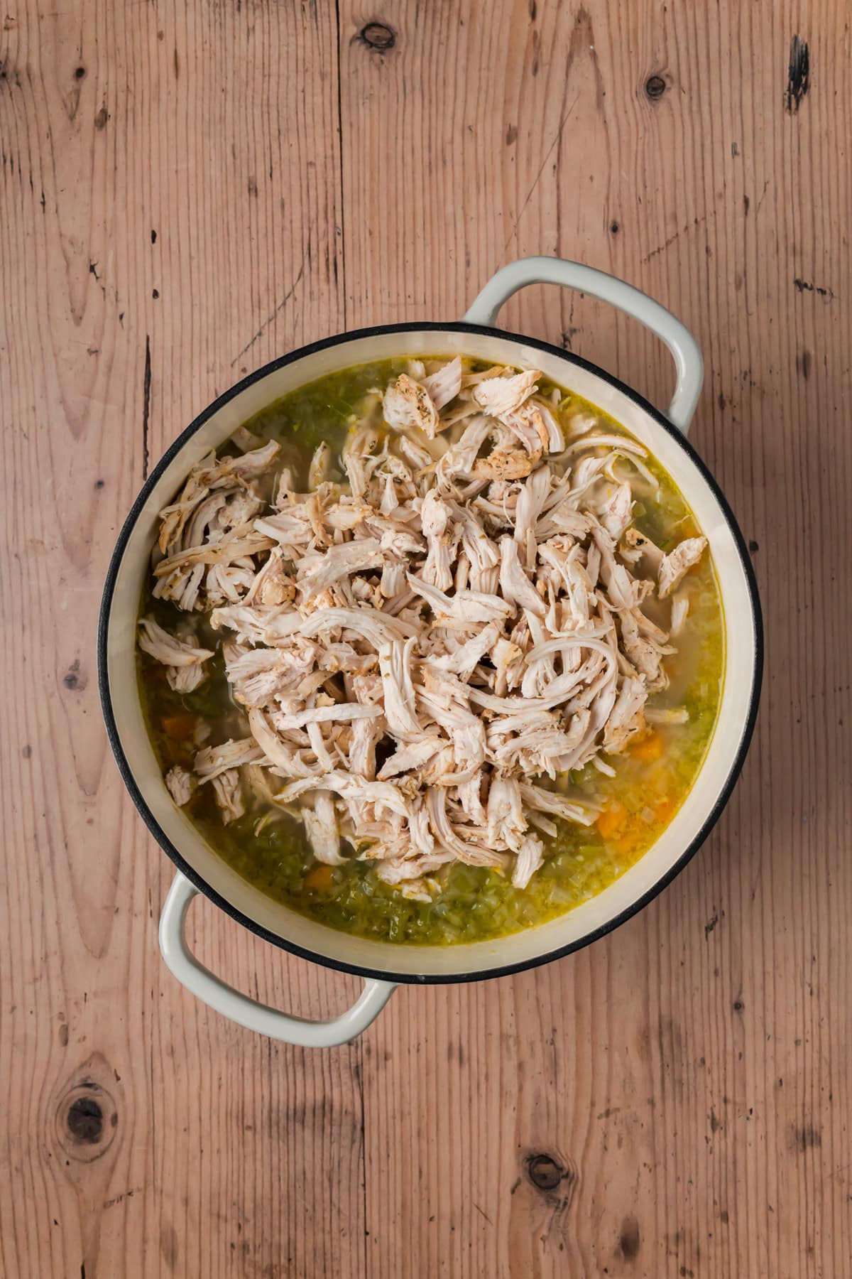 Chicken added to the soup.