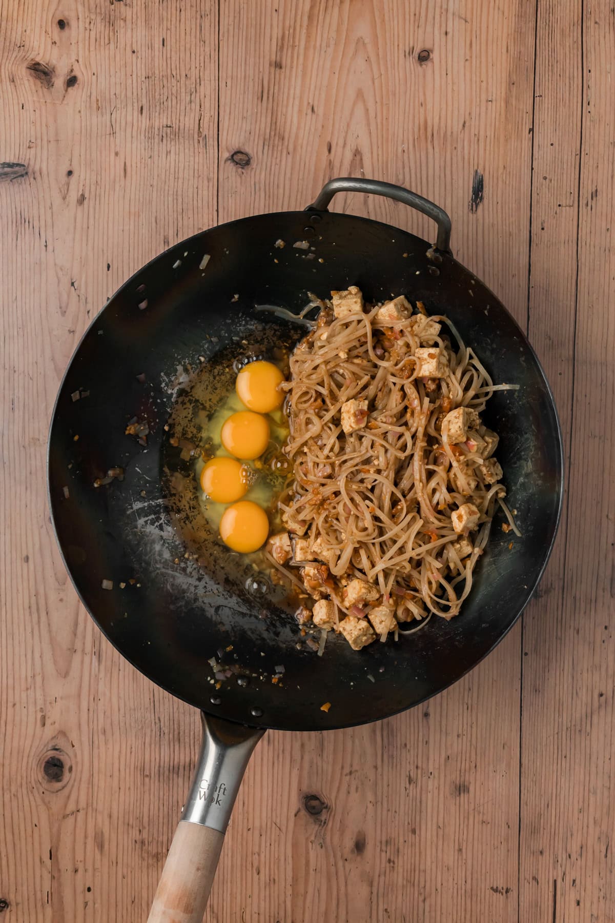 Eggs added to the wok.