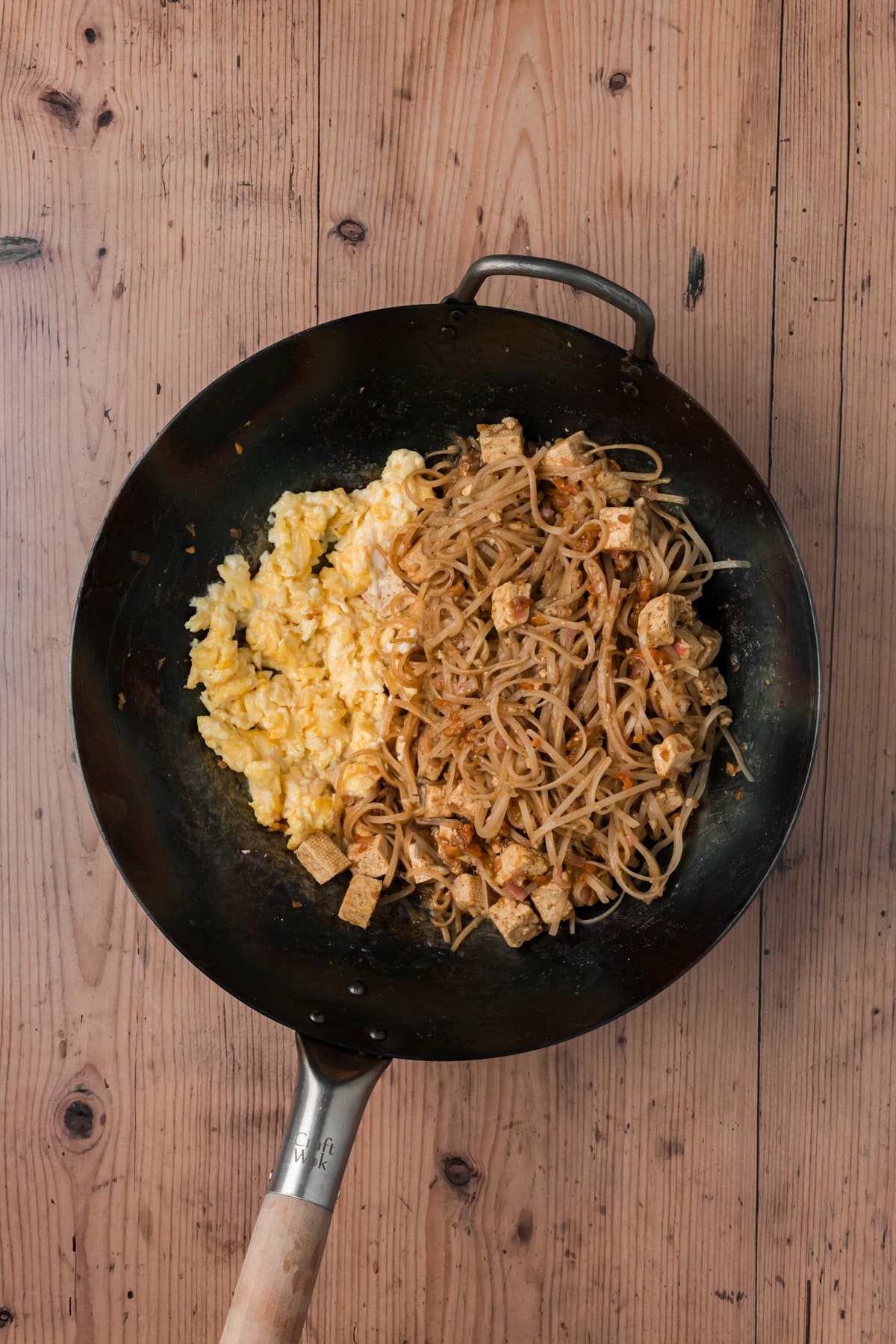 Eggs after they have been scrambled in the wok.