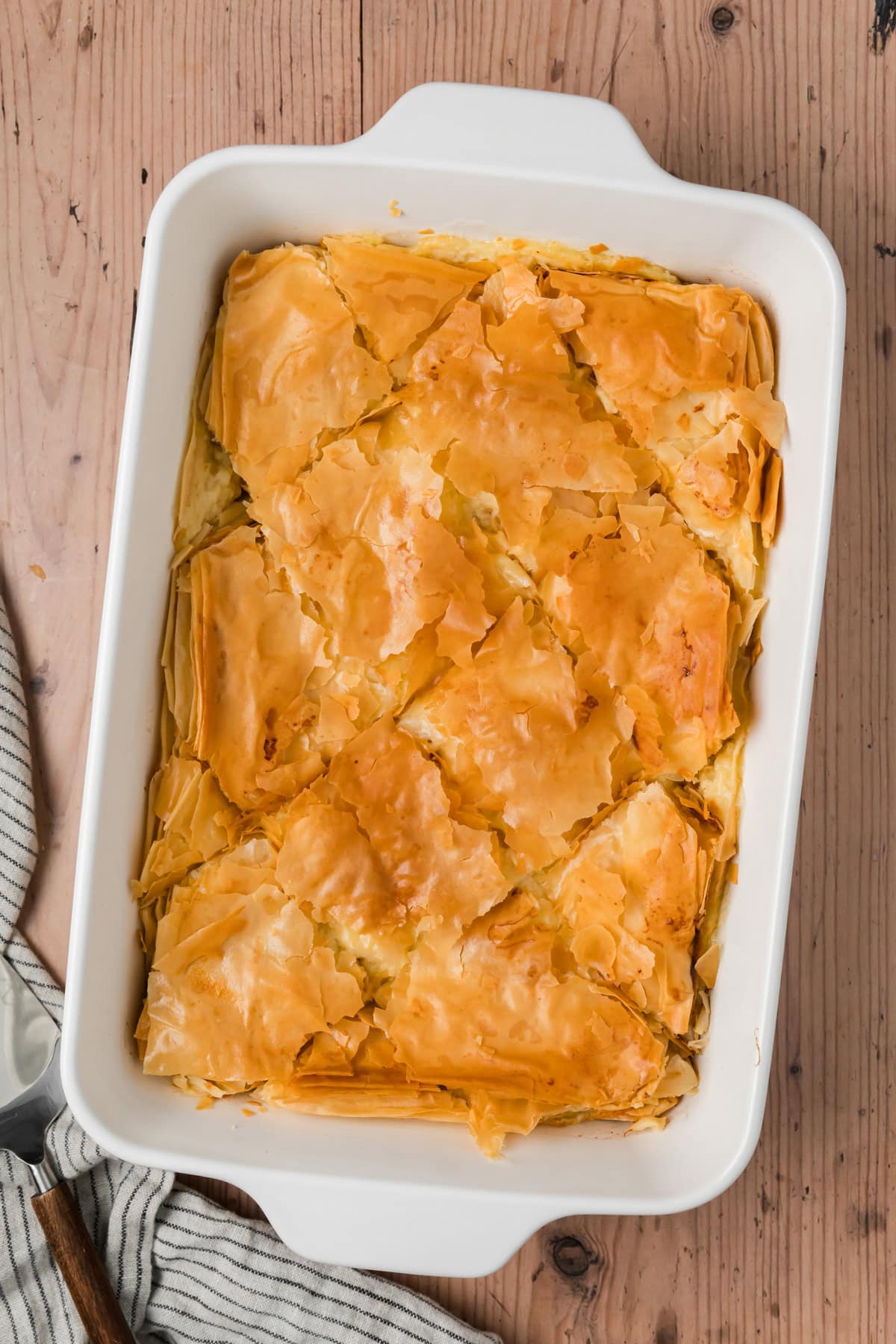 Bougatsa after it has baked in the oven and been sliced.