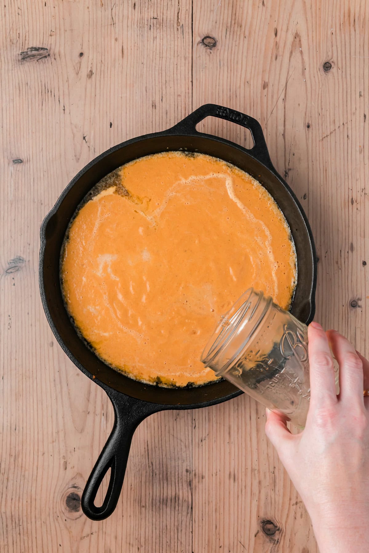 Water added to the skillet. 