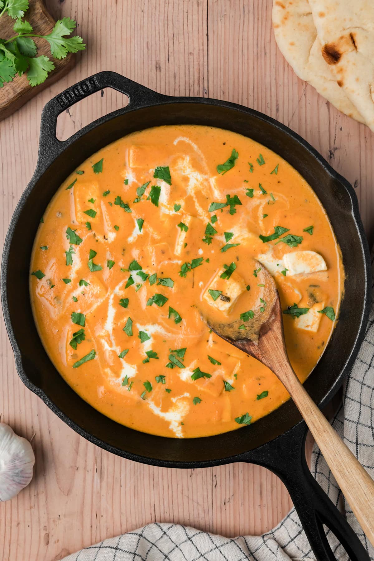 Paneer butter masala in a skillet. 